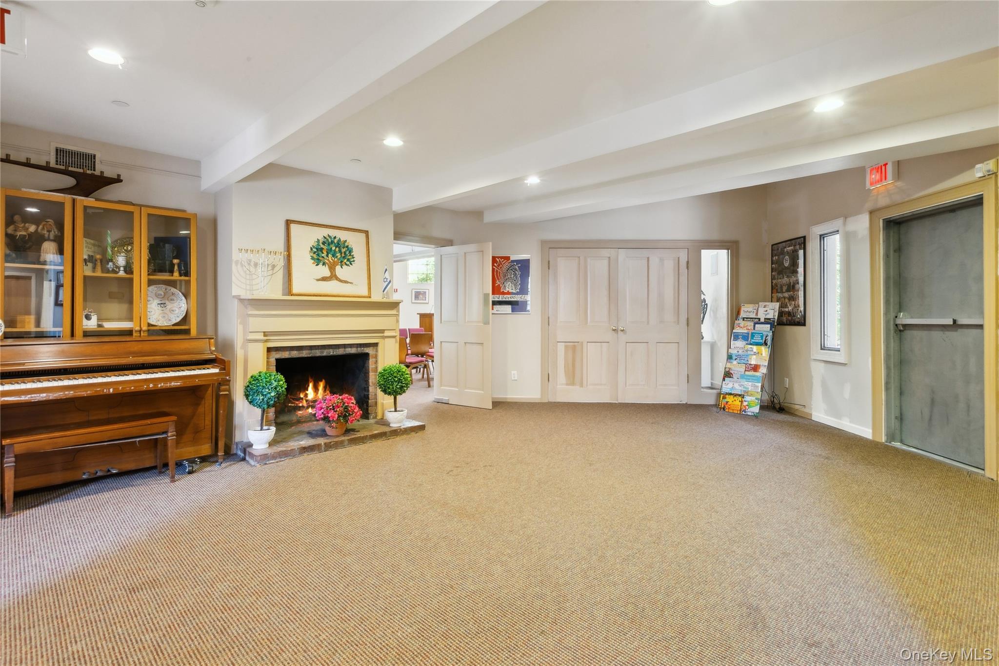 58 Goose Hill Road Cold Spring Harbor, NY 11724 - Photo 24 of 32 an empty room with furniture and a fireplace