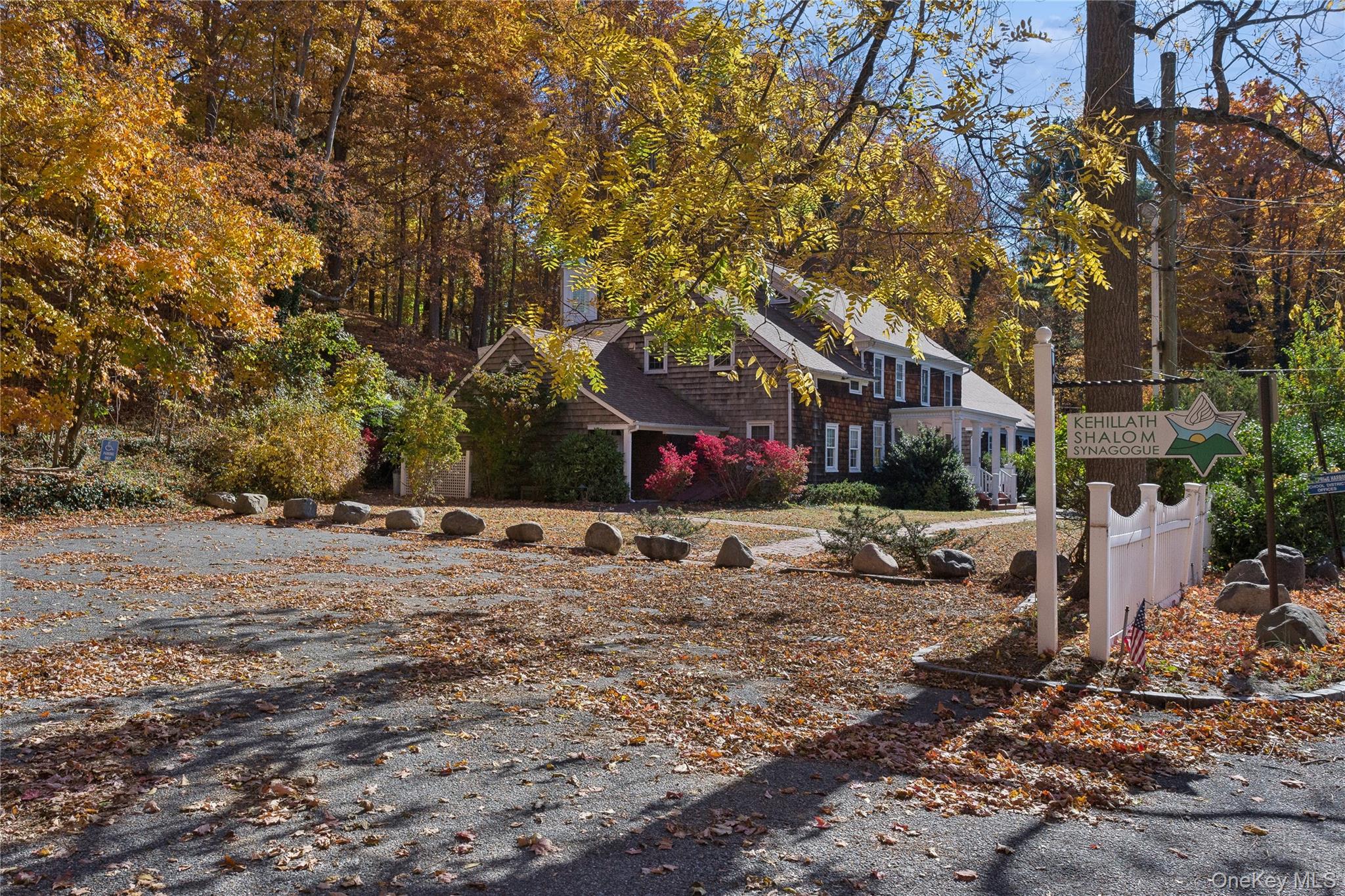 58 Goose Hill Road Cold Spring Harbor, NY 11724 - Photo 9 of 32 a street view with large trees