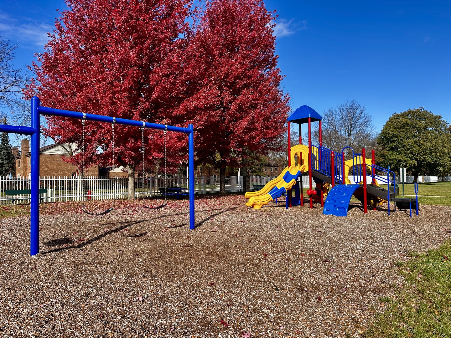 1603 North Windsor Drive, Unit 102 Arlington Heights, IL 60004 - Photo 17 of 18 a view of a park with swings
