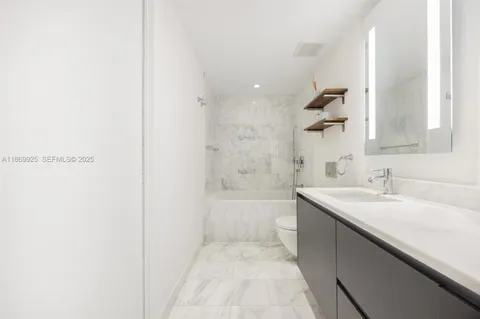 a view of a city with tall buildings