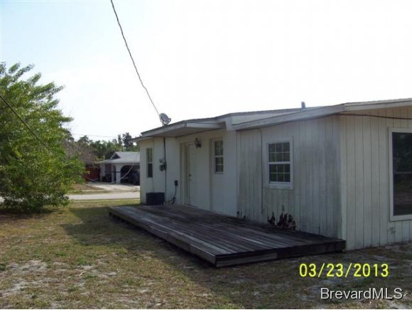 3299 Northeast Jackson Palm Bay, FL 32905 - Photo 2 of 12 a house view with a backyard space