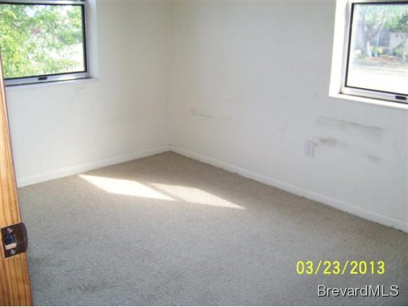 3299 Northeast Jackson Palm Bay, FL 32905 - Photo 4 of 12 an empty room with a window