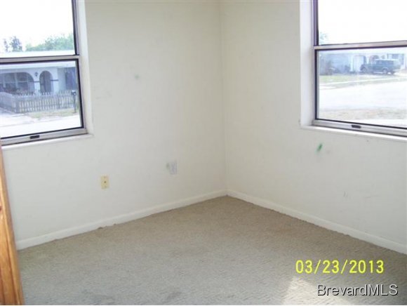 3299 Northeast Jackson Palm Bay, FL 32905 - Photo 5 of 12 an empty room with a window