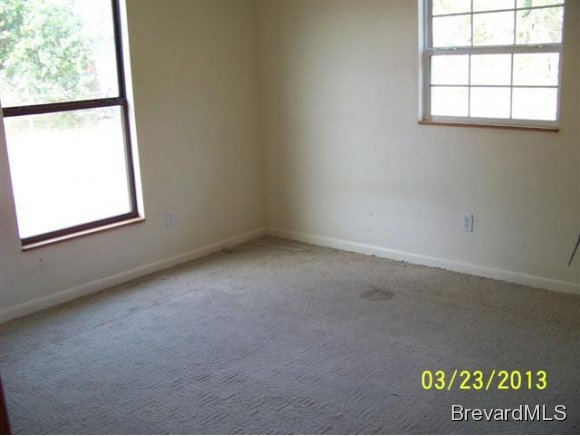3299 Northeast Jackson Palm Bay, FL 32905 - Photo 7 of 12 an empty room with a window