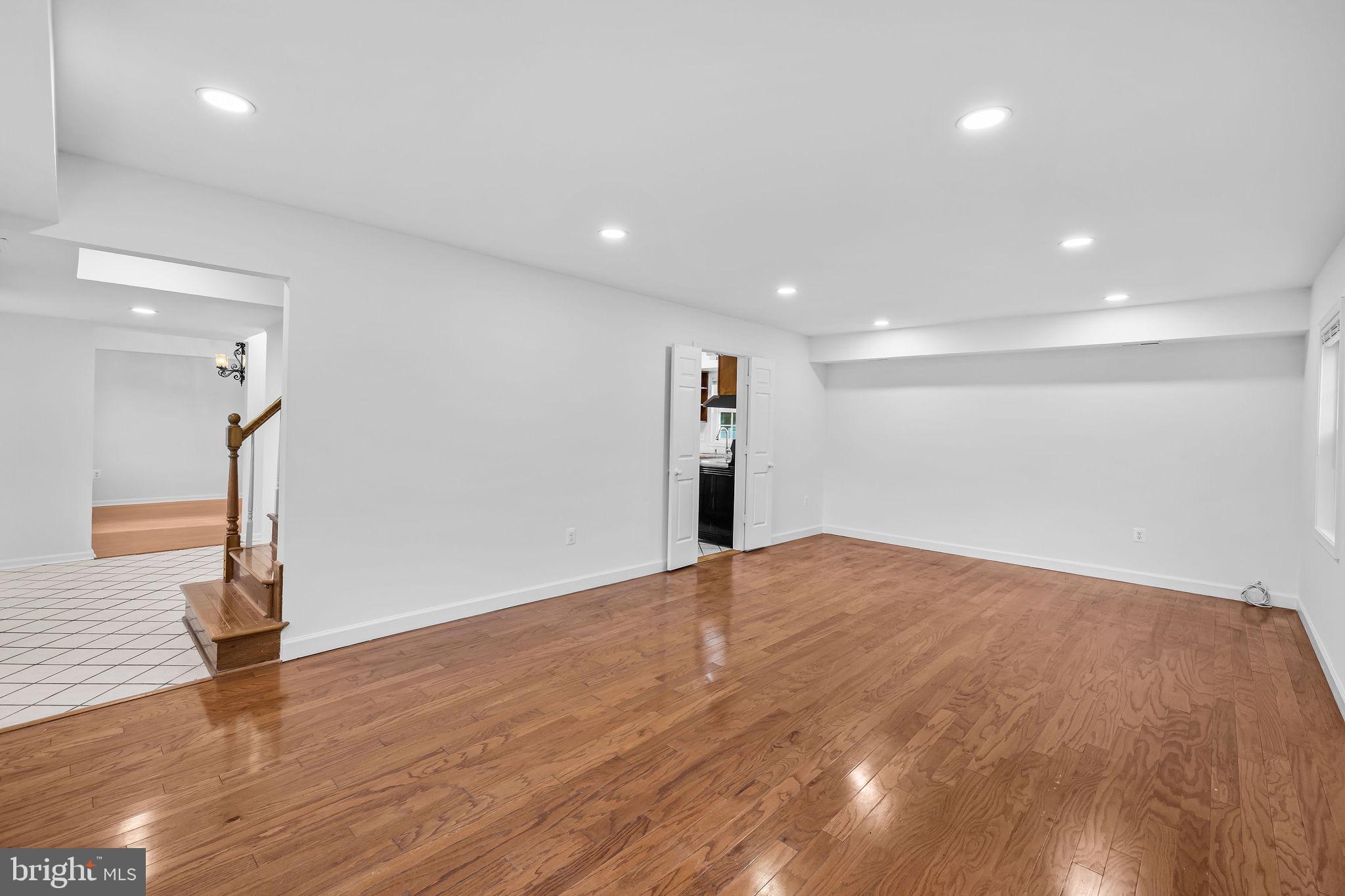 4001 Middle Ridge Drive Fairfax, VA 22033 - Photo 19 of 49 a view of an empty room with wooden floor