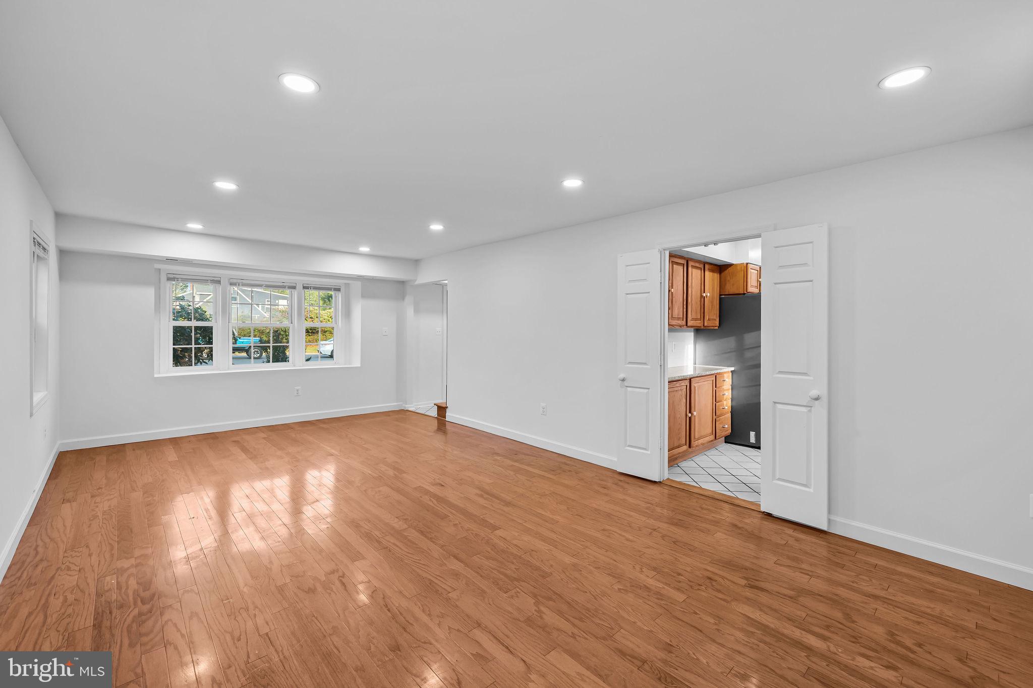 4001 Middle Ridge Drive Fairfax, VA 22033 - Photo 20 of 49 a view of an empty room with wooden floor and a window