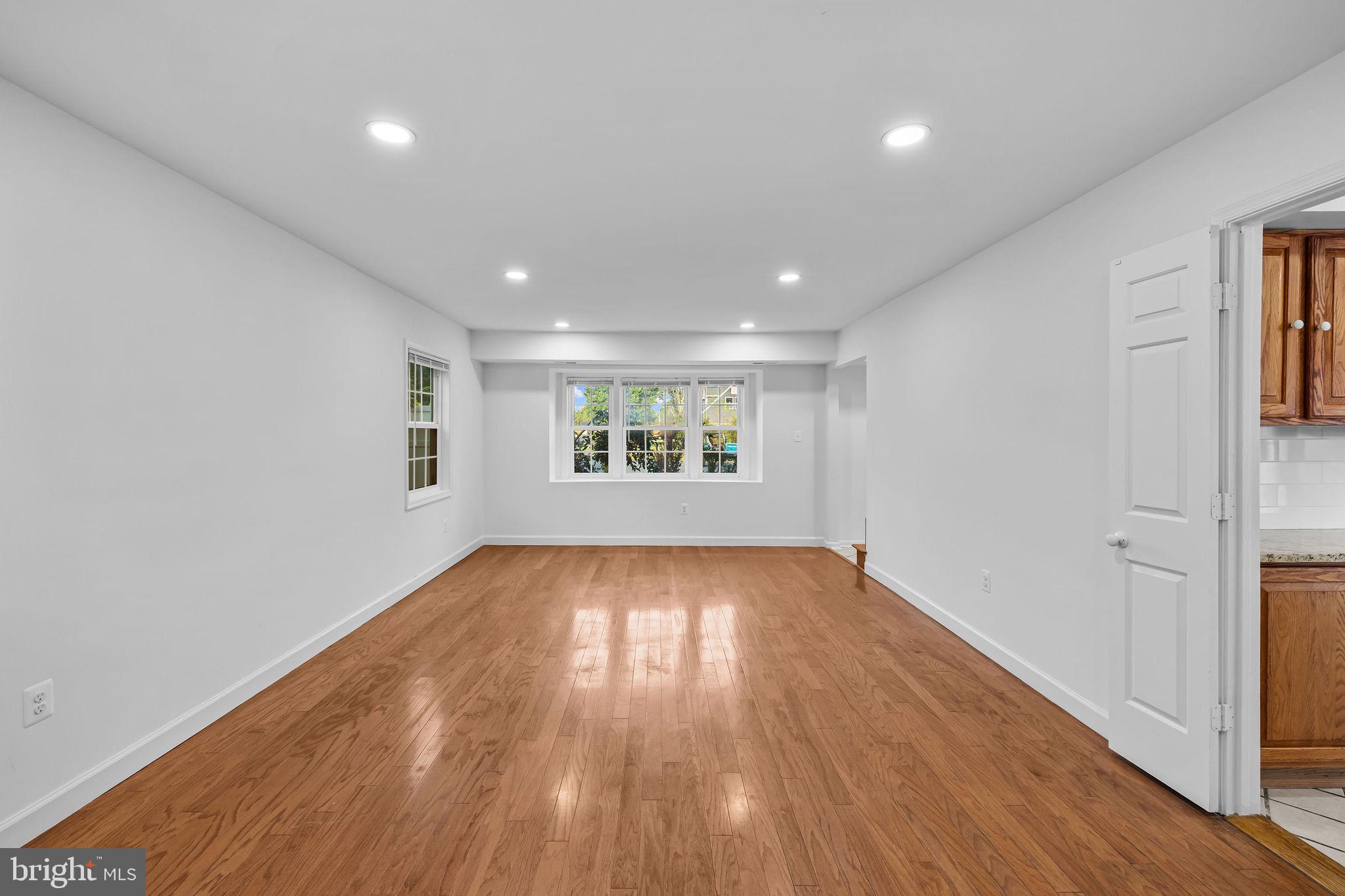 4001 Middle Ridge Drive Fairfax, VA 22033 - Photo 25 of 49 wooden floor in an empty room with a window