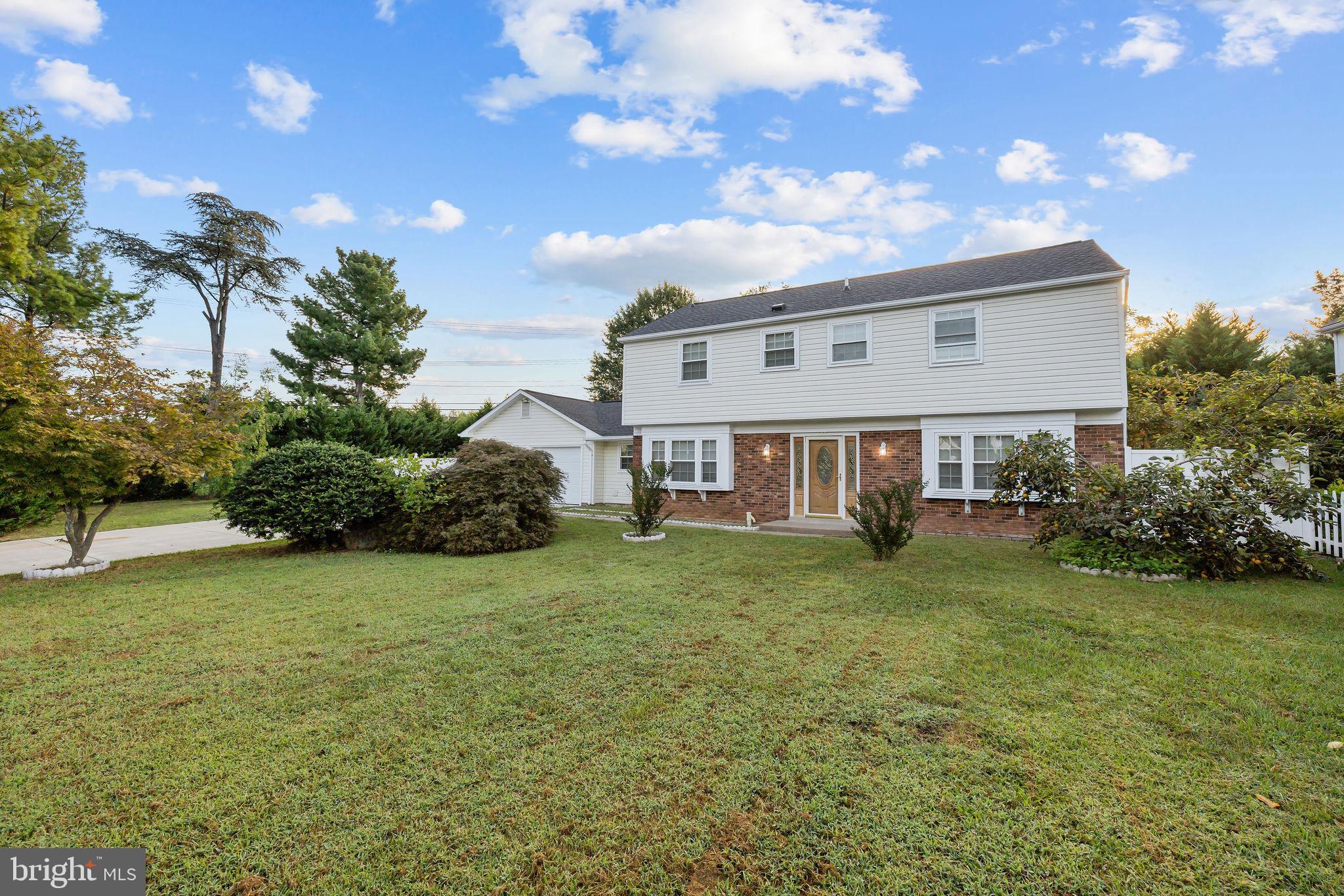 4001 Middle Ridge Drive Fairfax, VA 22033 - Photo 3 of 49 a view of a house with a big yard plants and large trees