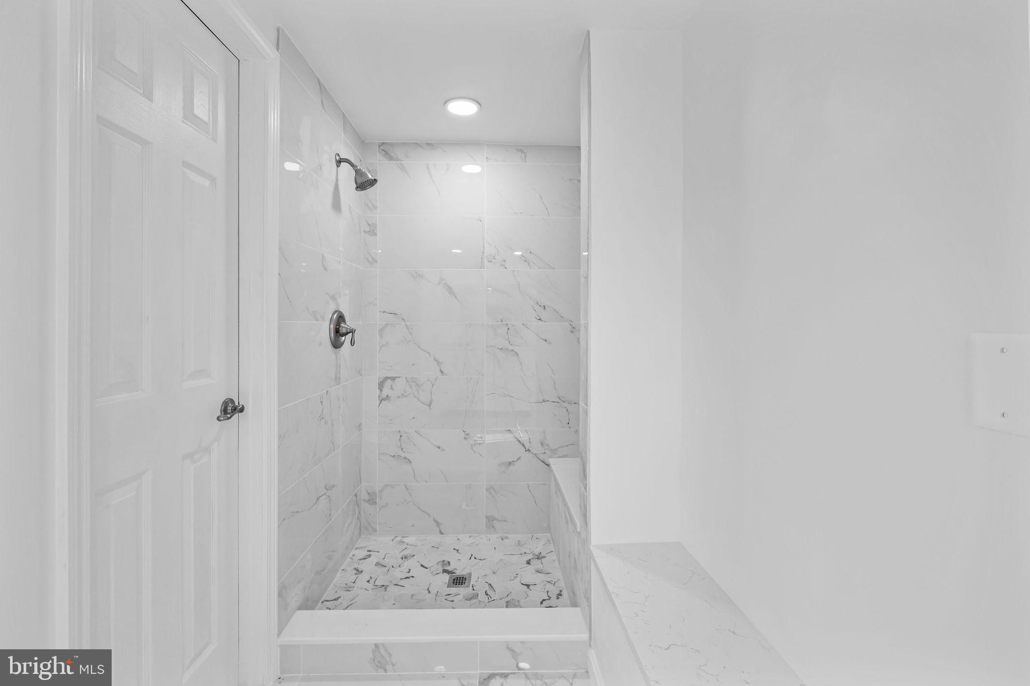 4001 Middle Ridge Drive Fairfax, VA 22033 - Photo 38 of 49 a bathroom with a shower