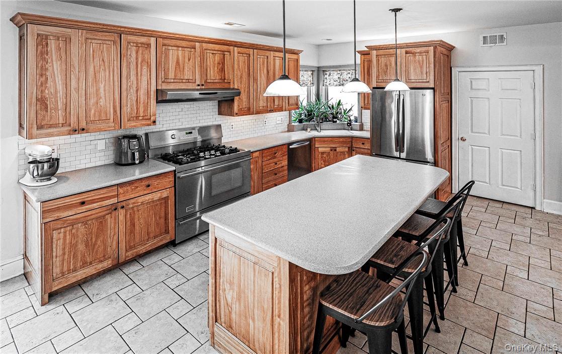20 Rustic Hills Road Wurtsboro, NY 12790 - Photo 7 of 25 Breakfast bar big enough to hold four people...What's for breakfast dad?? or mom??? Large pantry behind that door.