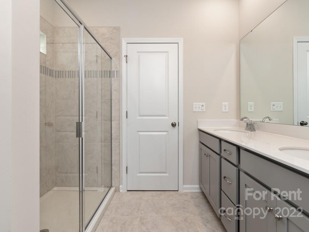 6531 Gopher Road Lancaster, SC 29720 - Photo 11 of 29 a bathroom with a shower and a sink
