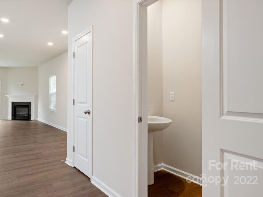 6531 Gopher Road Lancaster, SC 29720 - Photo 12 of 29 a view of a hallway with wooden floor