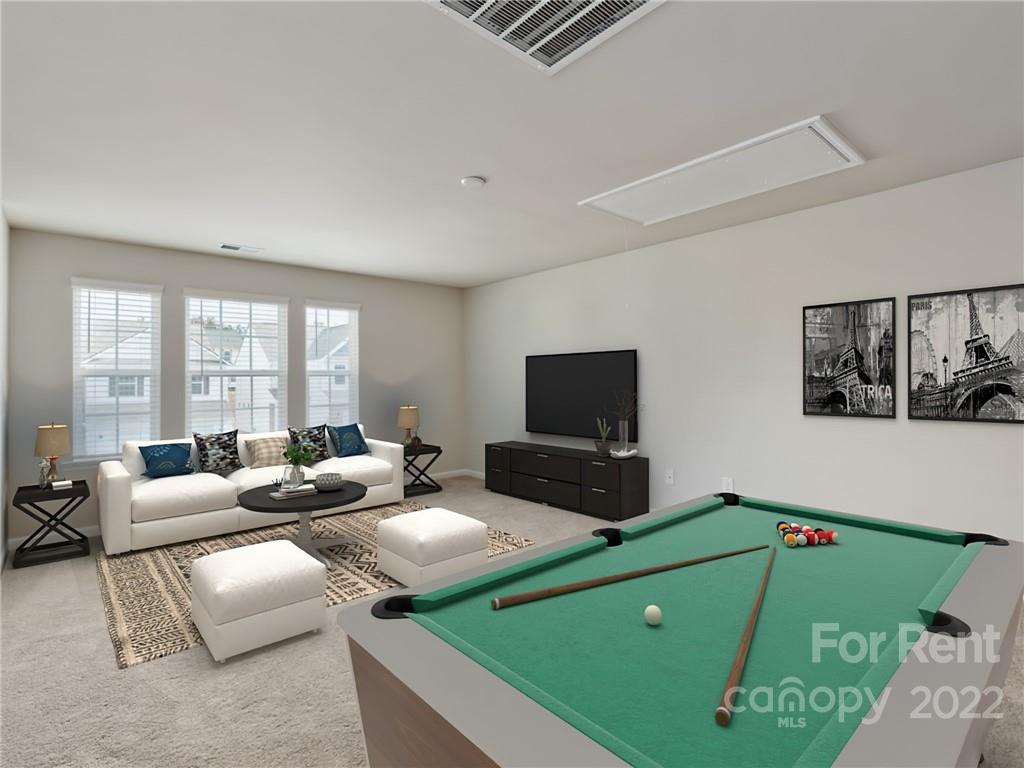 6531 Gopher Road Lancaster, SC 29720 - Photo 13 of 29 a living room with furniture and a flat screen tv