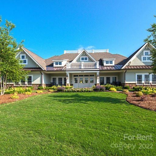 6531 Gopher Road Lancaster, SC 29720 - Photo 23 of 29 a front view of a house with garden and porch