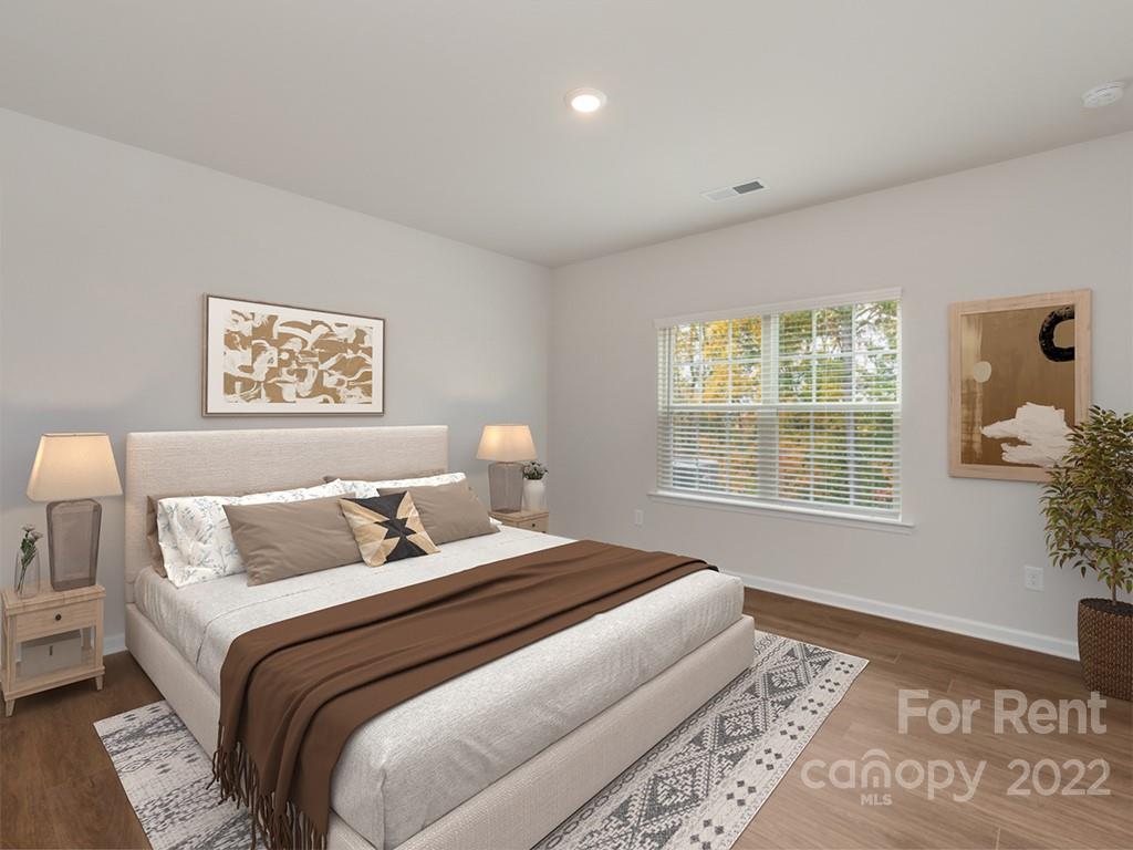 6531 Gopher Road Lancaster, SC 29720 - Photo 9 of 29 a bedroom with a large bed and a window