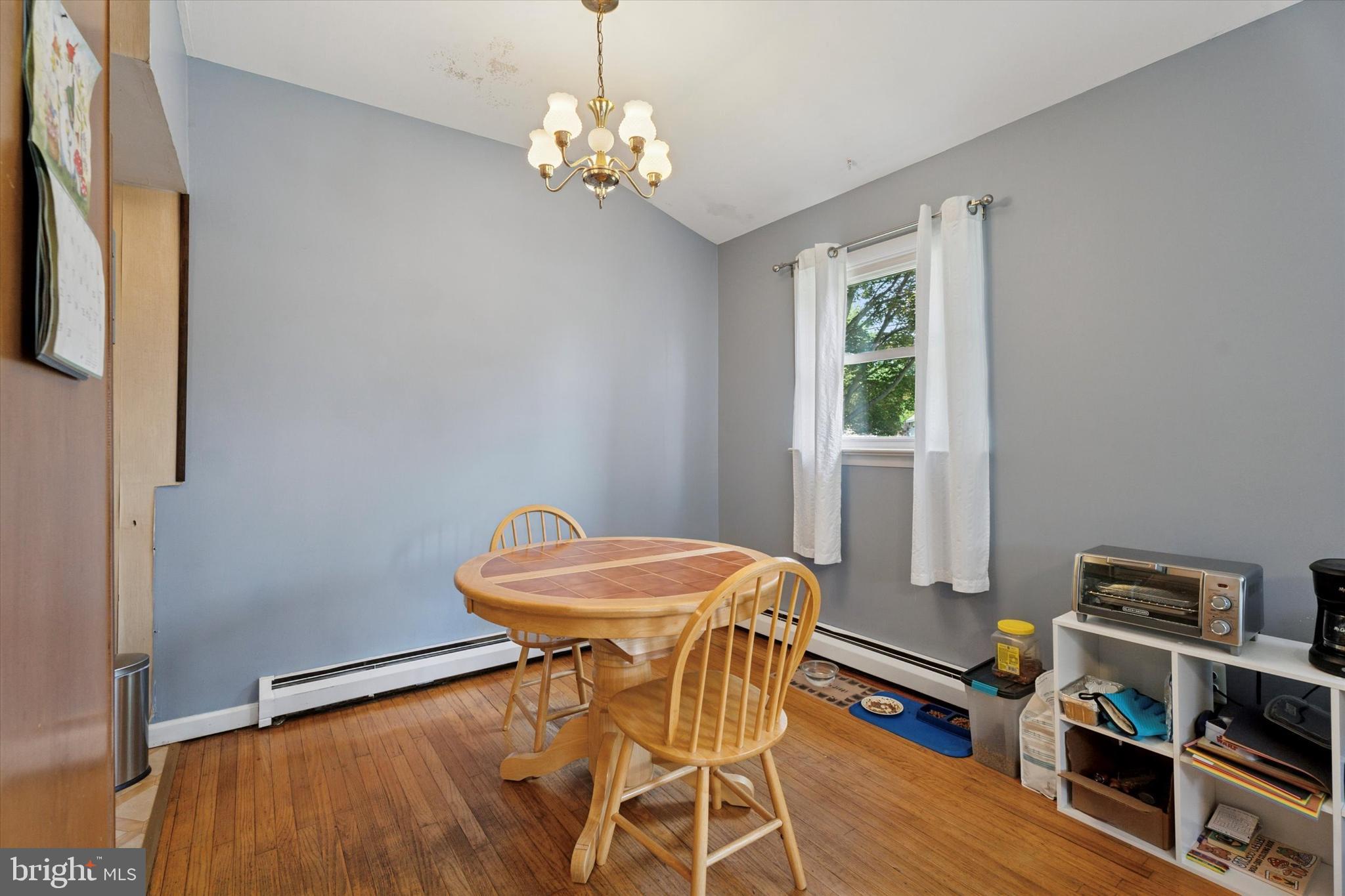 718 Cherry Street Lansdale, PA 19446 - Photo 11 of 23 a view of a dining room with furniture and wooden floor