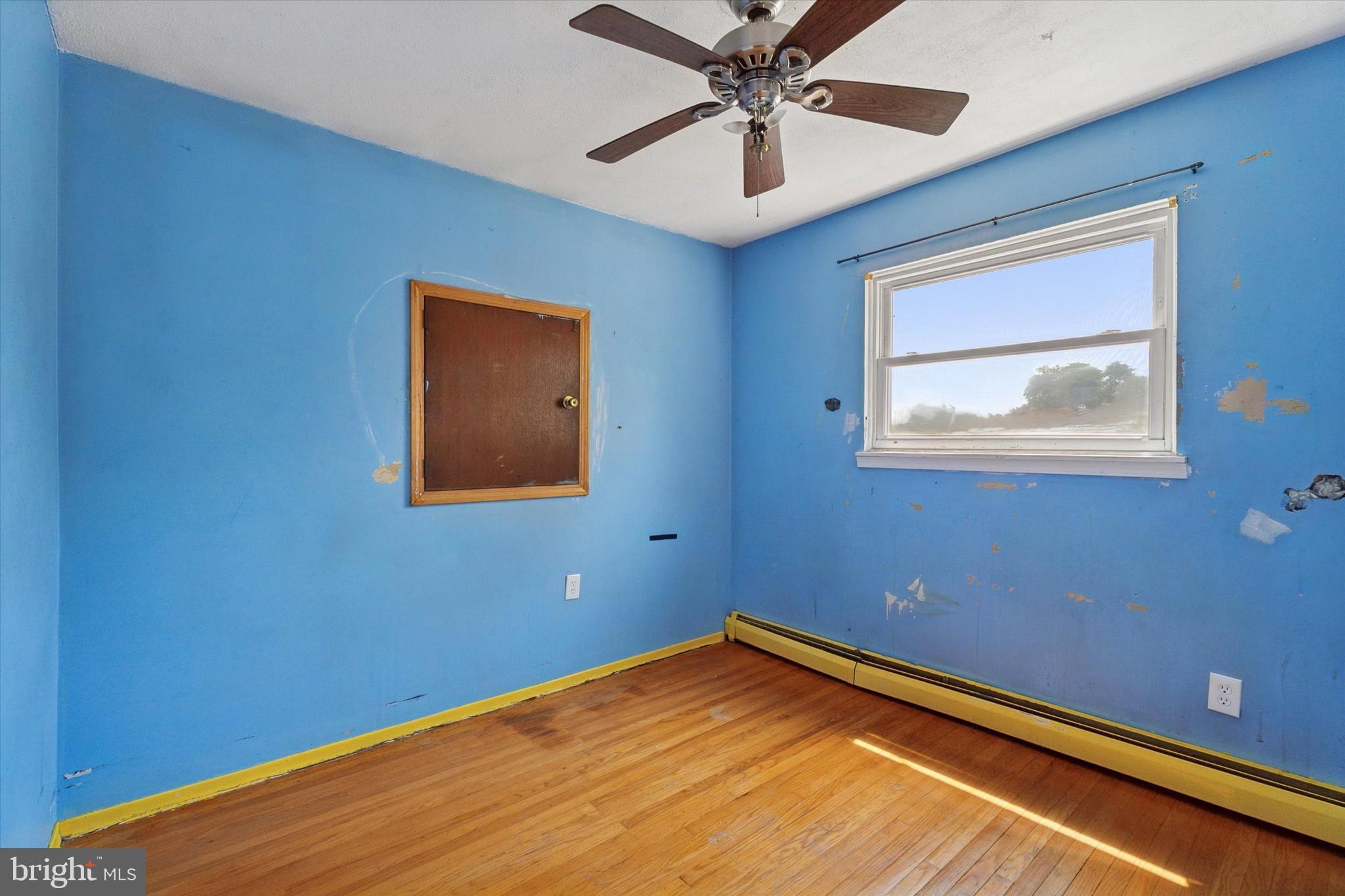 718 Cherry Street Lansdale, PA 19446 - Photo 19 of 23 a view of a big room with wooden floor and closet