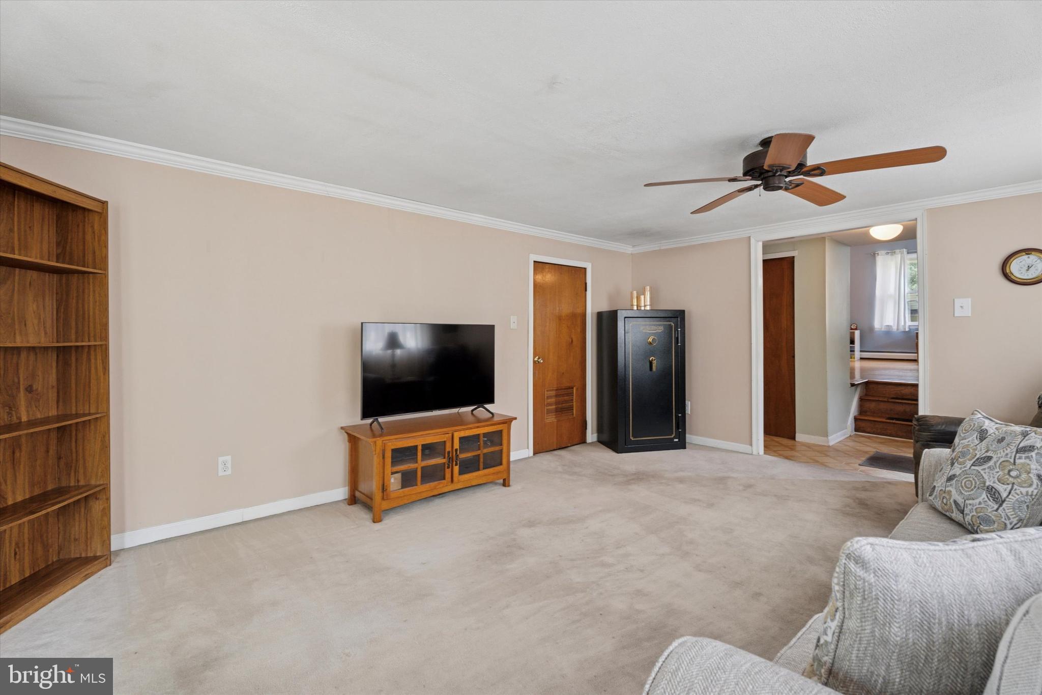 718 Cherry Street Lansdale, PA 19446 - Photo 2 of 23 a living room with furniture and a flat screen tv