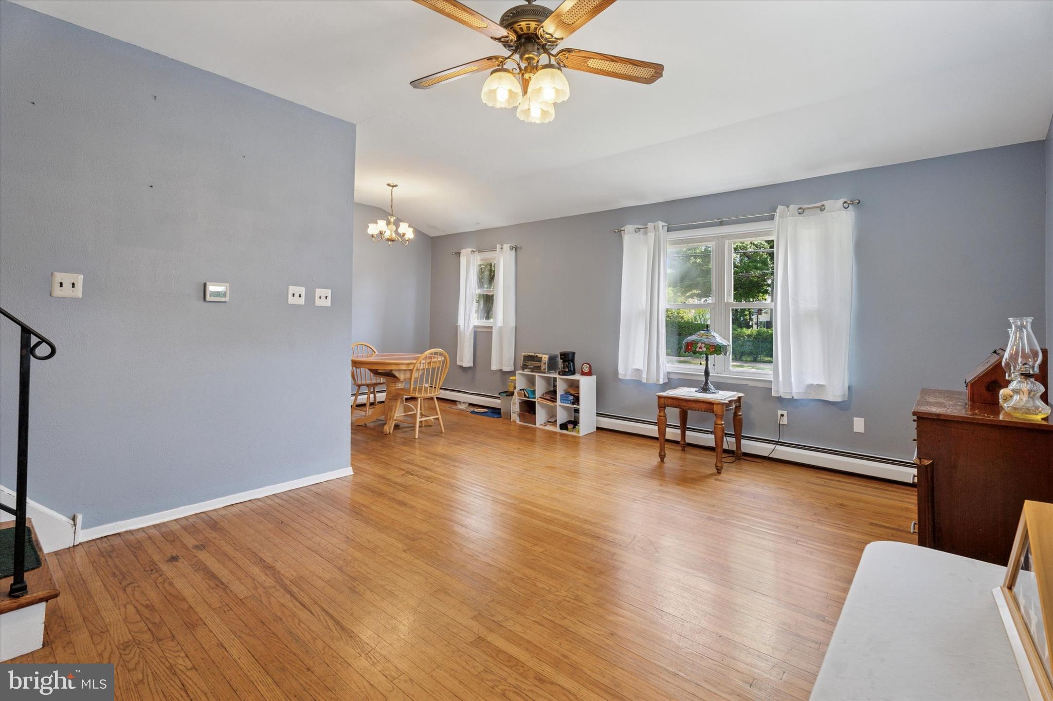 718 Cherry Street Lansdale, PA 19446 - Photo 9 of 23 a living room with furniture and a wooden floor