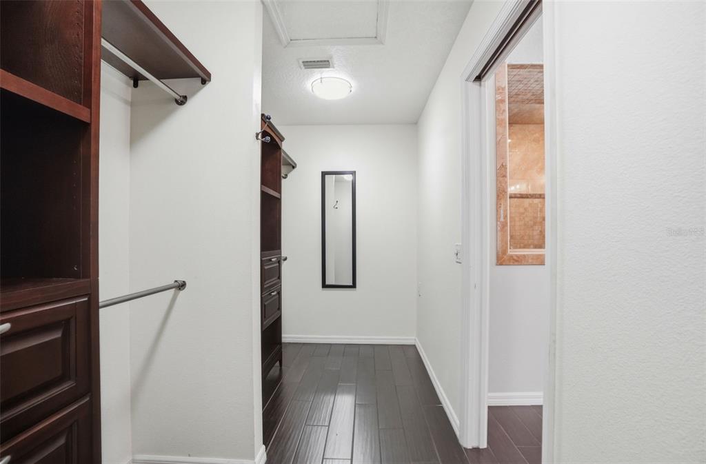7037 County Road 625 Bushnell, FL 33513 - Photo 43 of 99 a view of a hallway with wooden floor and entryway