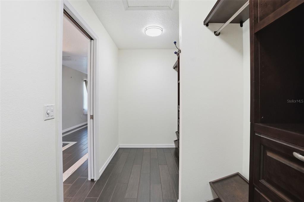 7037 County Road 625 Bushnell, FL 33513 - Photo 45 of 99 a view of hallway with wooden floor