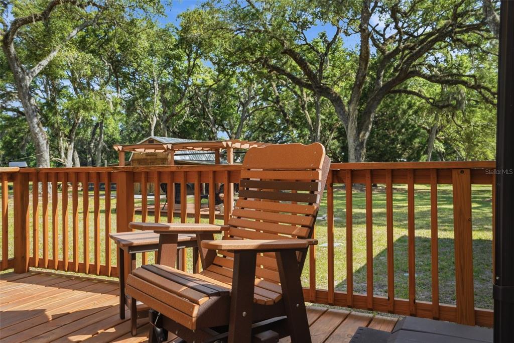 7037 County Road 625 Bushnell, FL 33513 - Photo 56 of 99 a view of a chairs and table in the roof deck