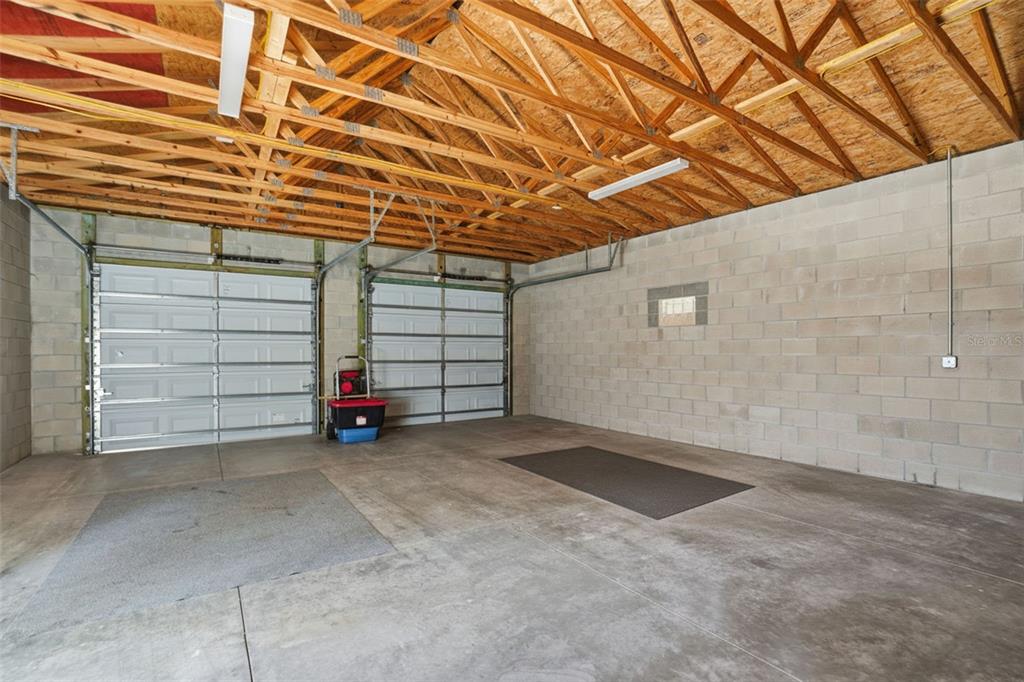 7037 County Road 625 Bushnell, FL 33513 - Photo 74 of 99 a view of a car garage