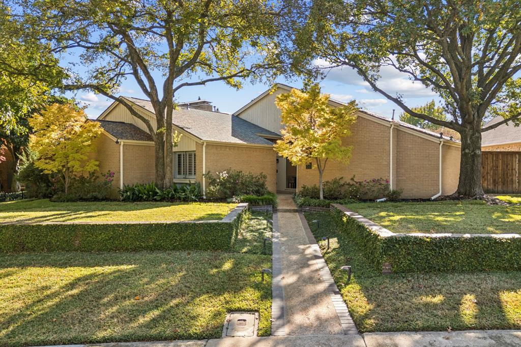 View of front of home with brick siding