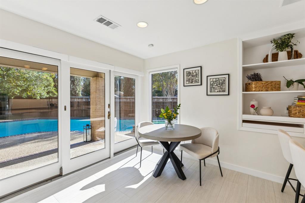 9616 Viewside Drive Dallas, TX 75231 - Photo 12 of 38 Dining space with built in features and recessed lighting