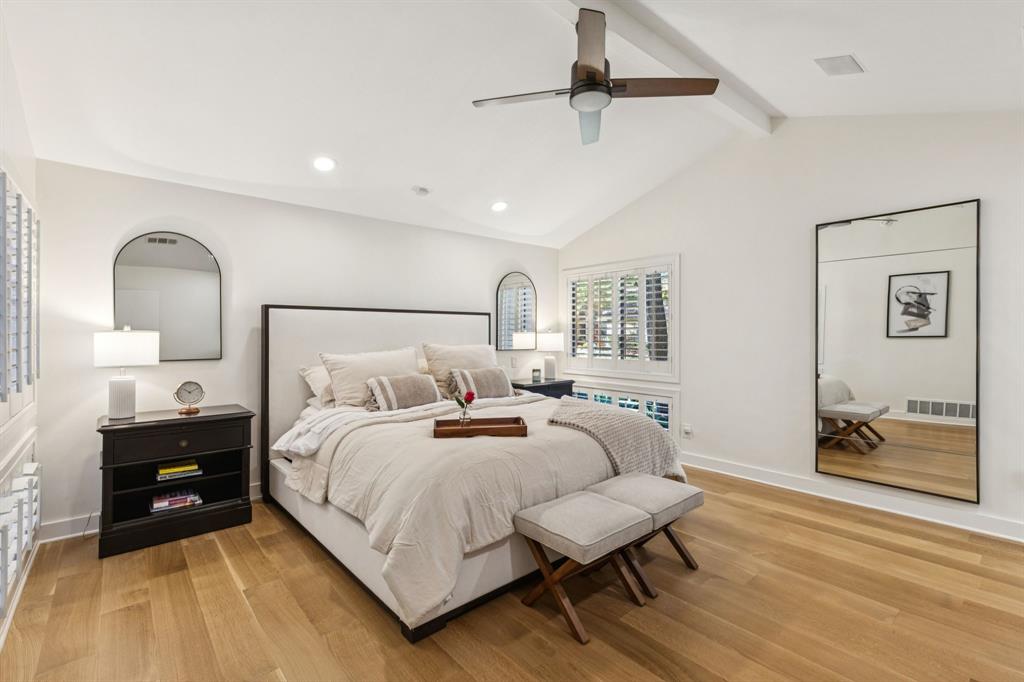 9616 Viewside Drive Dallas, TX 75231 - Photo 18 of 38 Bedroom with light wood-style floors and a ceiling fan