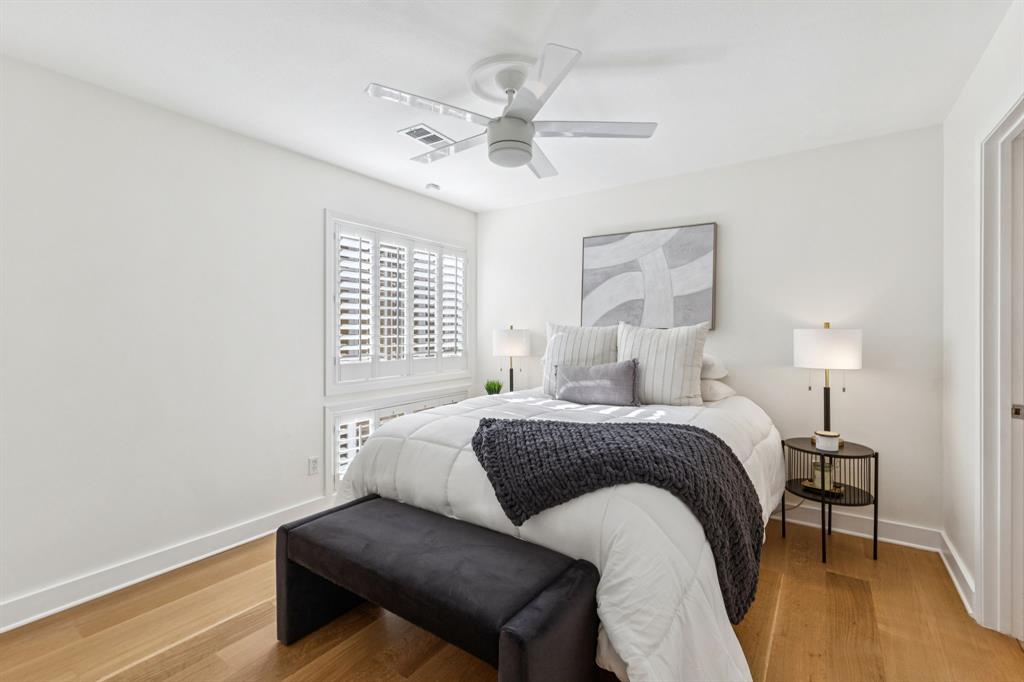 9616 Viewside Drive Dallas, TX 75231 - Photo 24 of 38 Bedroom with wood finished floors and ceiling fan