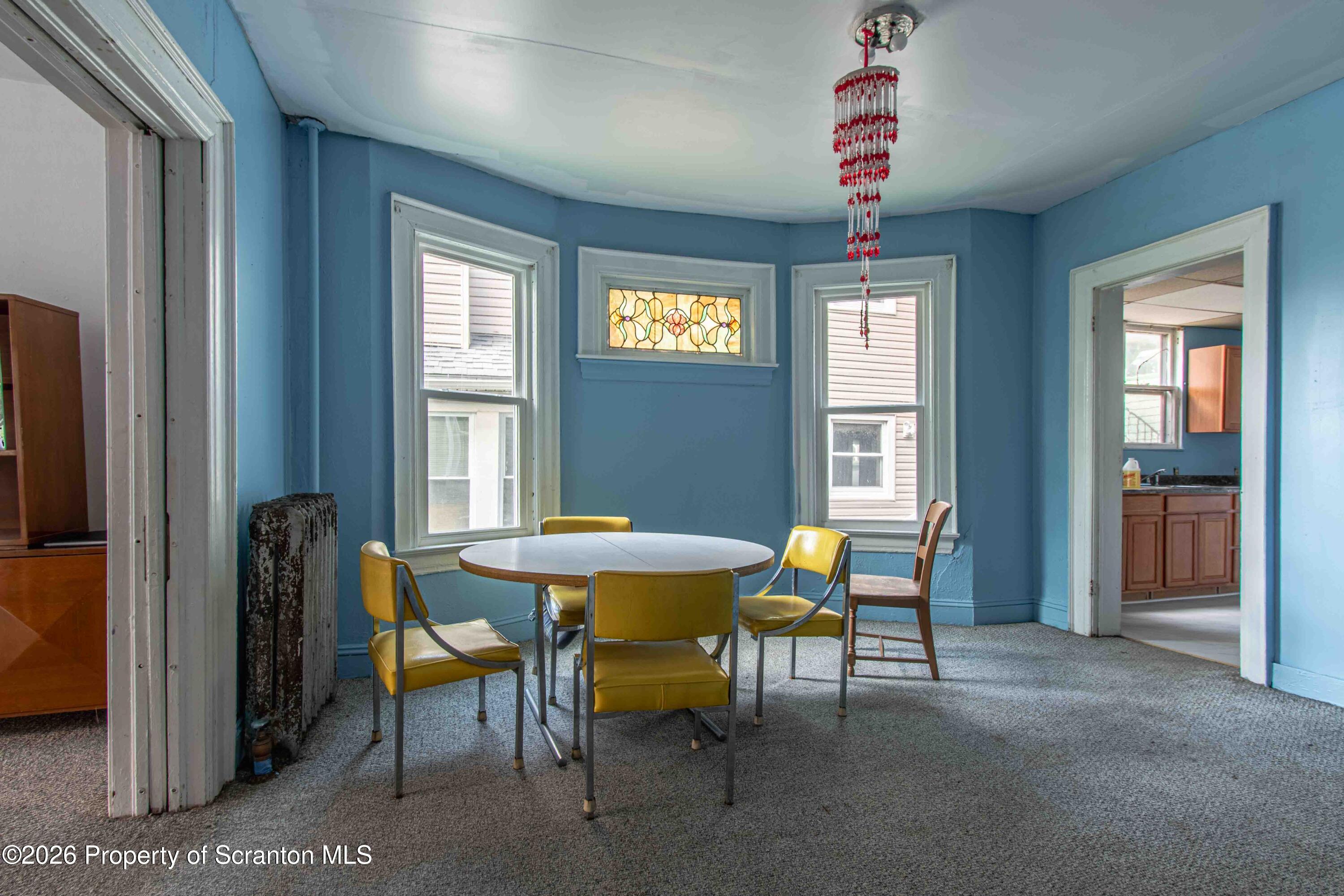 844 Monroe Avenue, Unit 844 Scranton, PA 18510 - Photo 6 of 15 a dining room with furniture and window