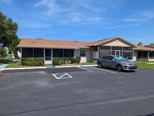 a car parked in front of a house