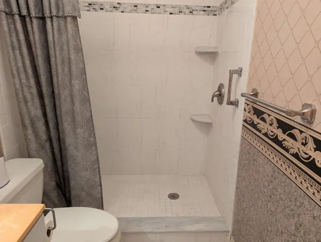 a kitchen with a stove and a sink