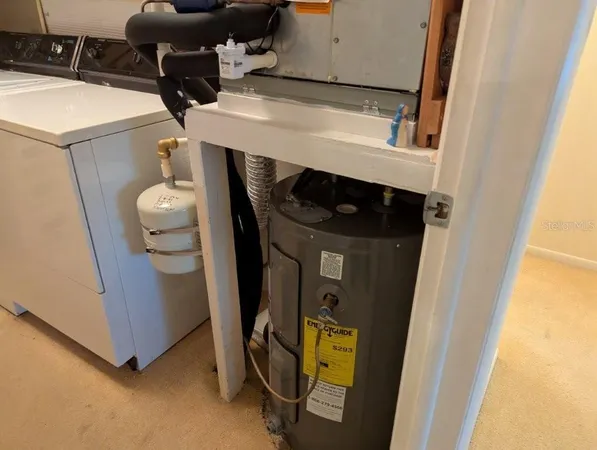 a kitchen with a stove and a microwave