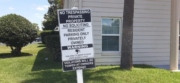 a view of backyard with a garden and entertaining space