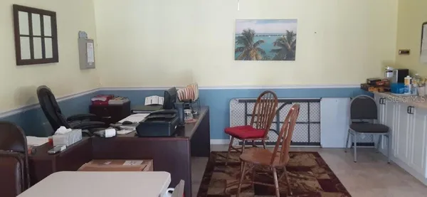 a view of a swimming pool with a patio and yard