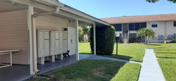 a view of a swimming pool with a patio