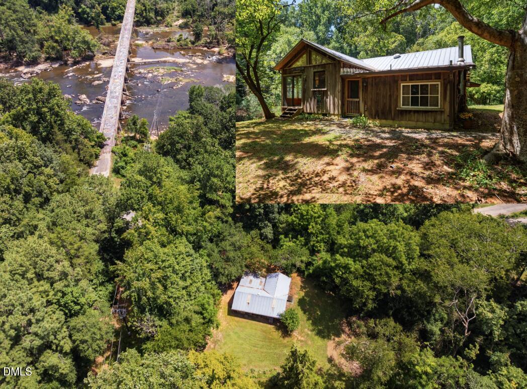 a backyard of a house with a yard and outdoor seating
