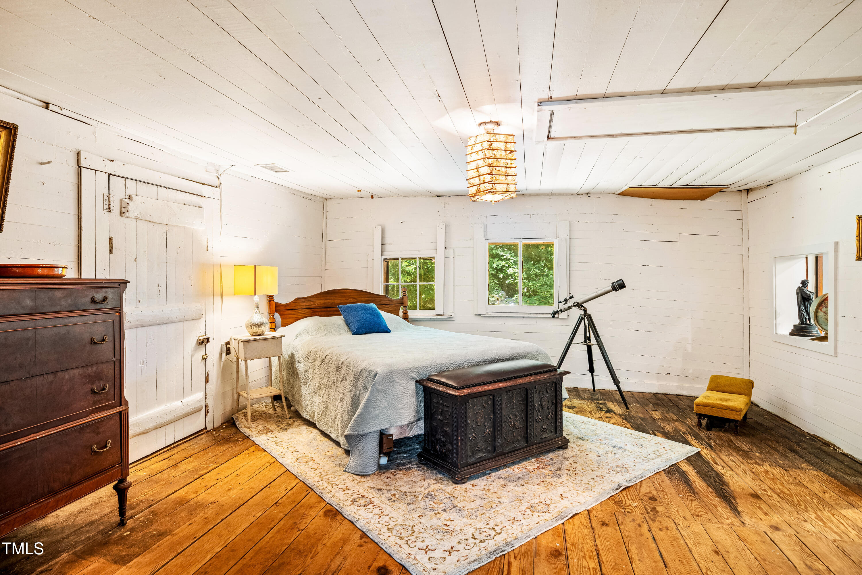 10 Bynum Beach Road Pittsboro, NC 27312 - Photo 21 of 41 a bed room with a bed and a window