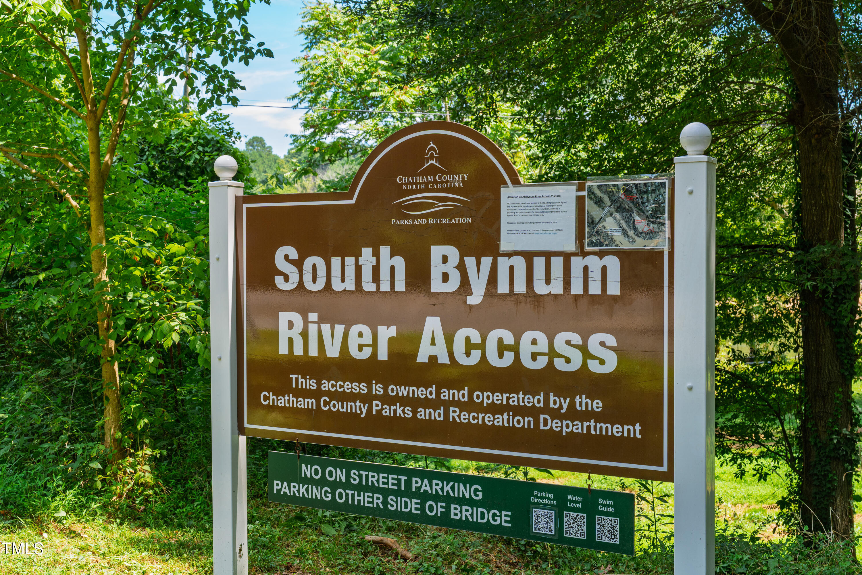 10 Bynum Beach Road Pittsboro, NC 27312 - Photo 31 of 41 a view of sign board with a house