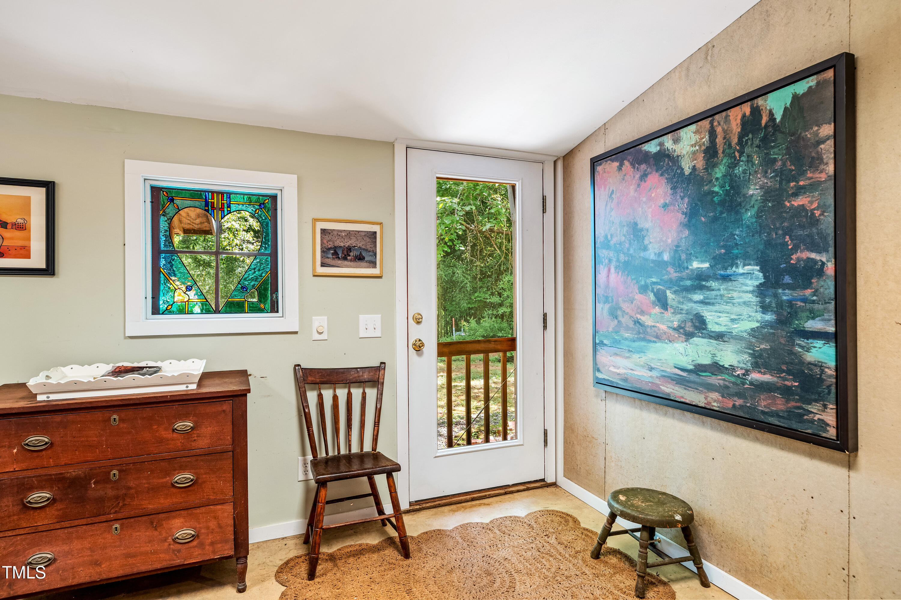 10 Bynum Beach Road Pittsboro, NC 27312 - Photo 8 of 41 a view of a workspace with furniture and a window