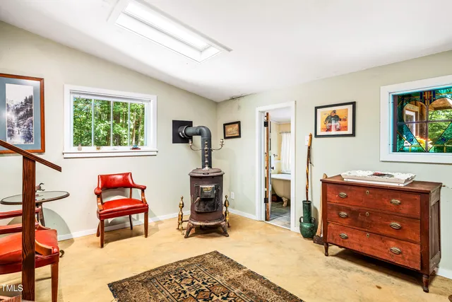 a room with furniture and a window