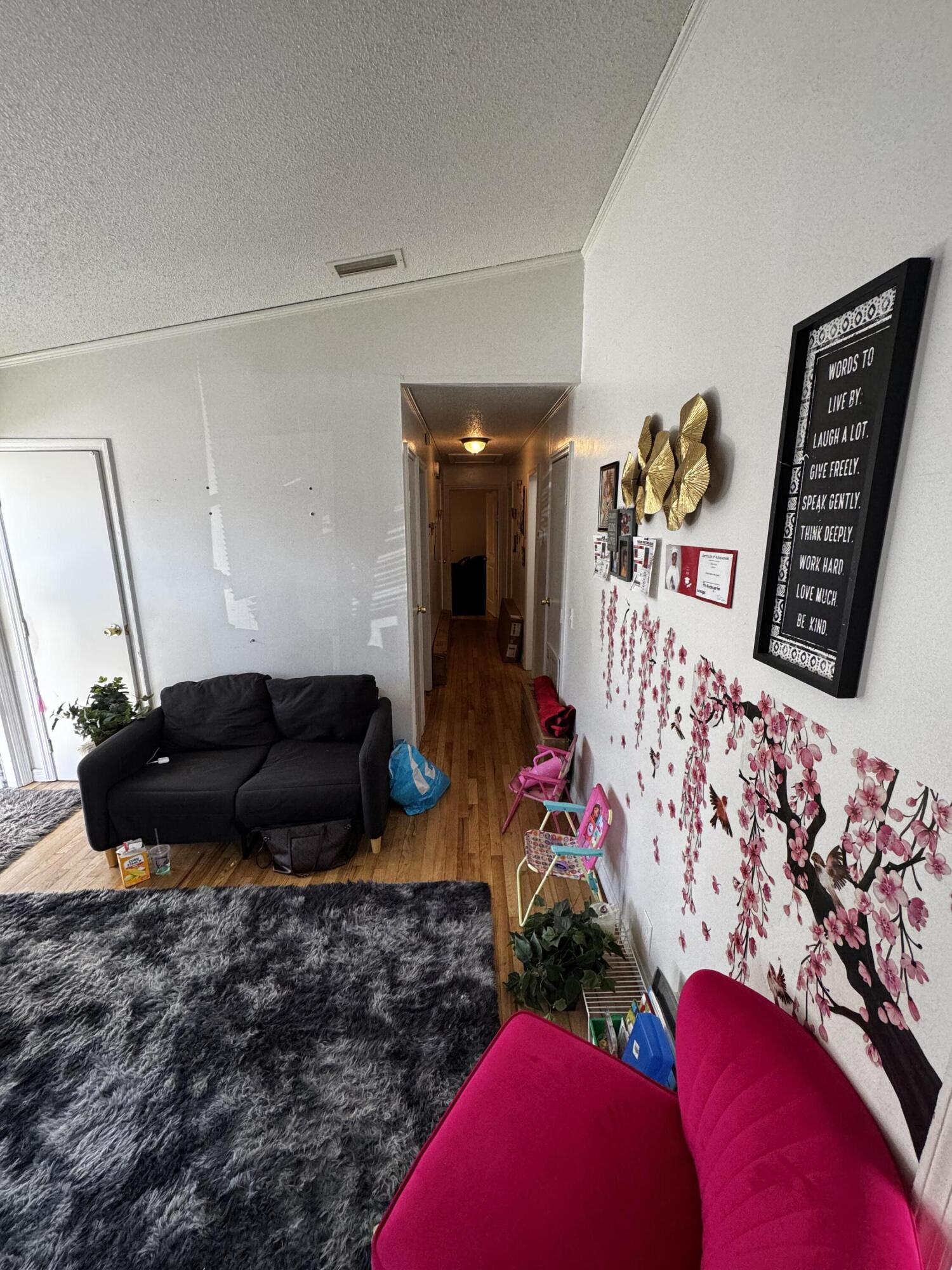 1464 West 32nd Street Riviera Beach, FL 33404 - Photo 5 of 6 living room and hallway