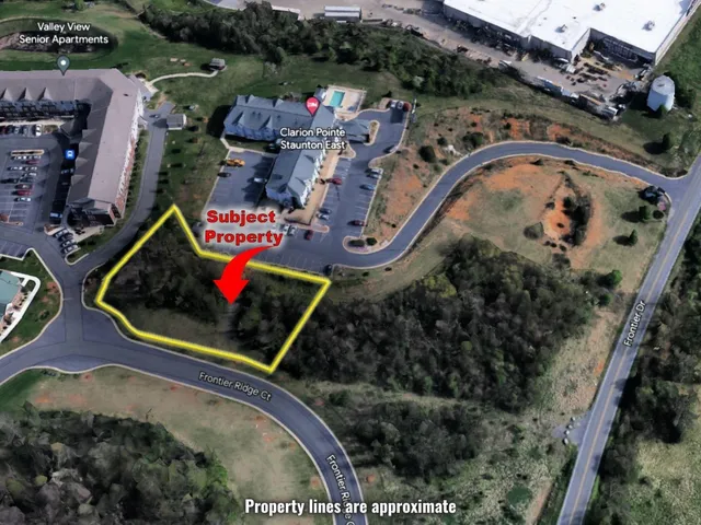 an aerial view of a house swimming pool and outdoor space