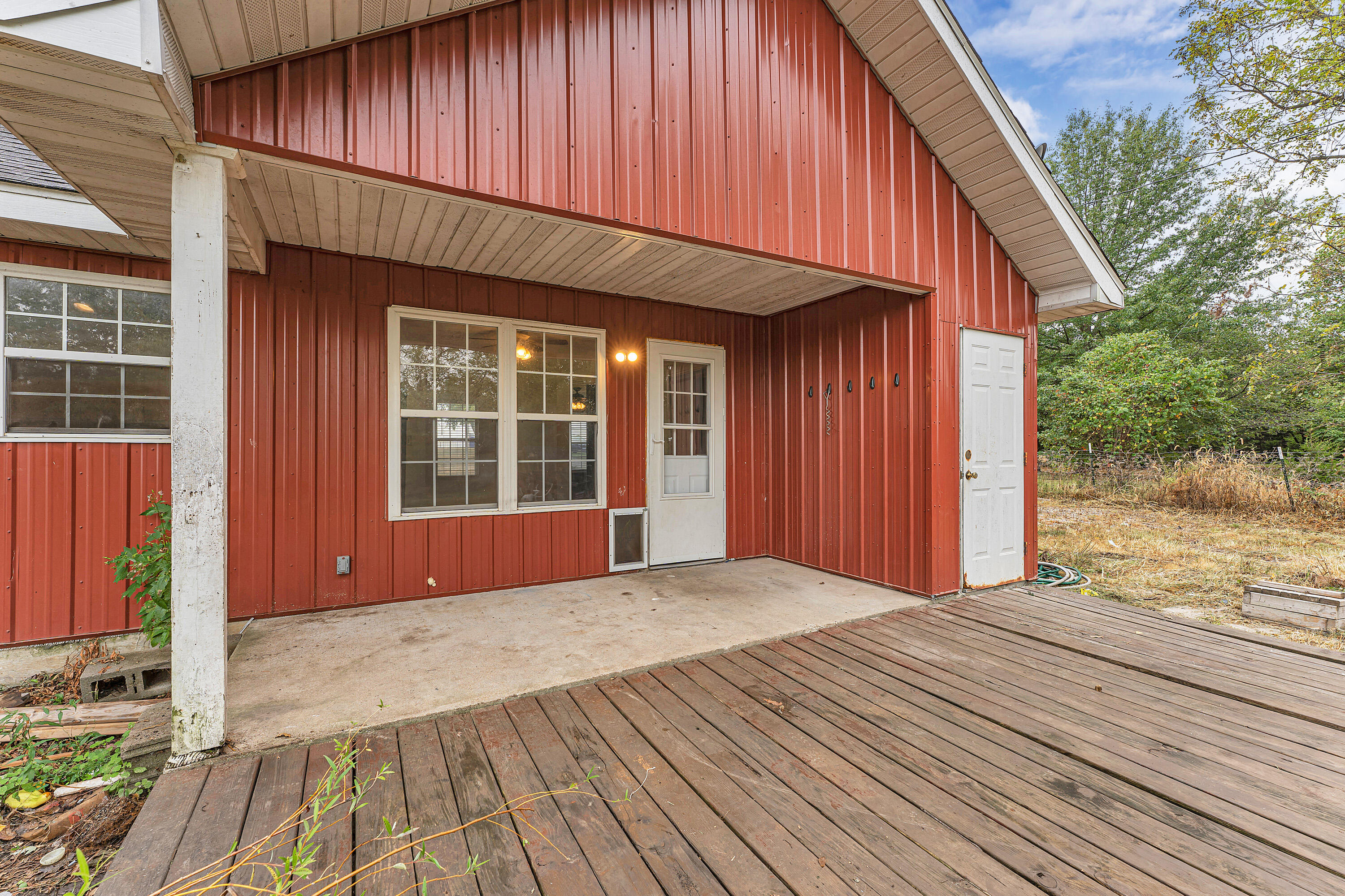 1015 State Rd Aa Fair Grove, MO 65648 - Photo 34 of 64 Back Porch and Storage area