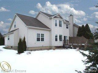16307 Quail Ridge Court Fenton, MI 48430 - Photo 2 of 24 Deck overlooks large yd