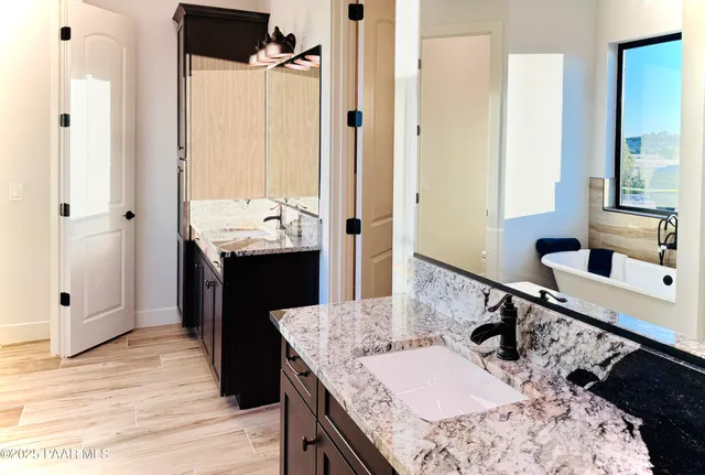 a view of a living room and entryway