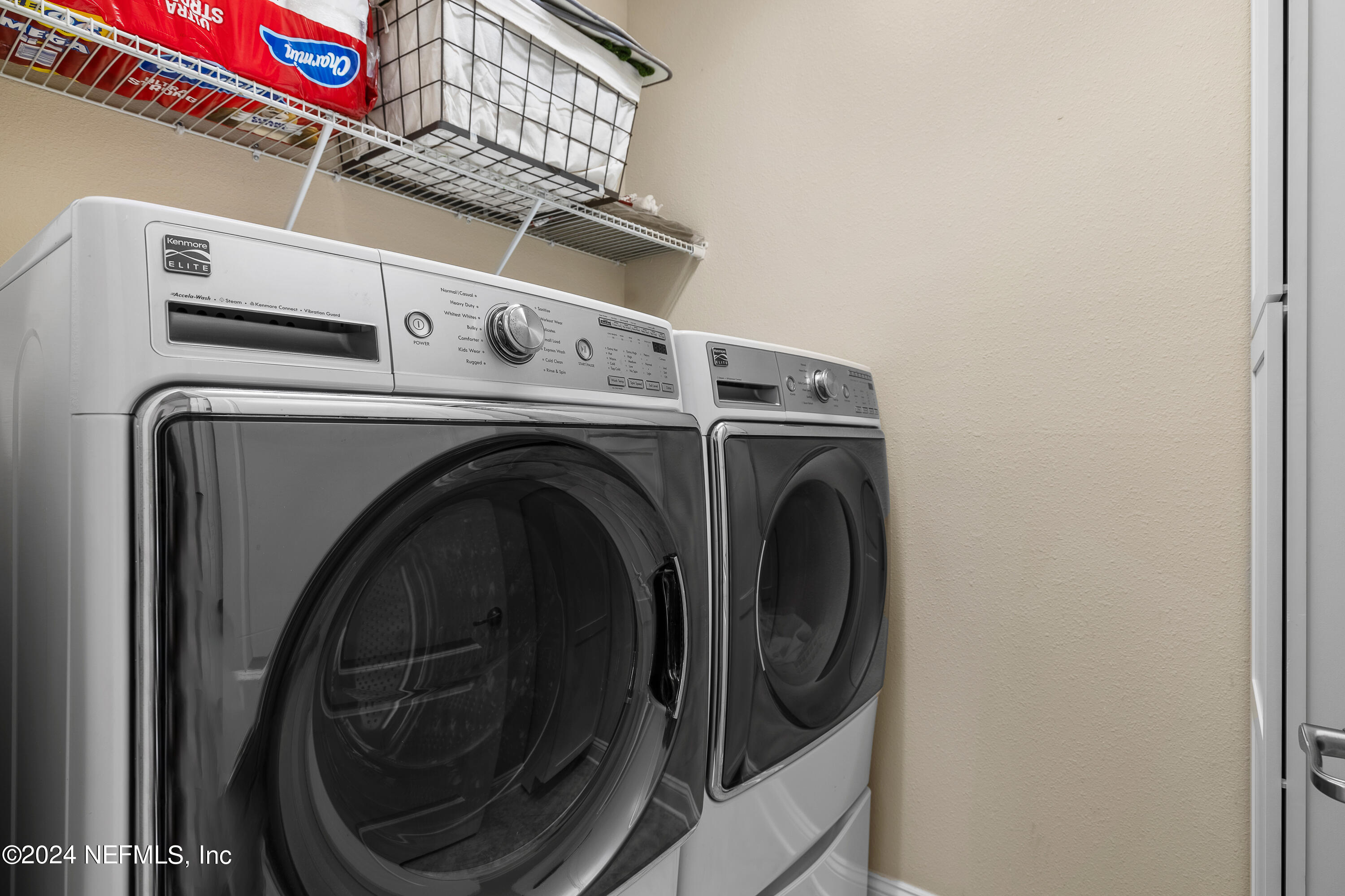 405 St Kitts Loop St. Augustine, FL 32092 - Photo 37 of 65 a close up view of washer and dryer