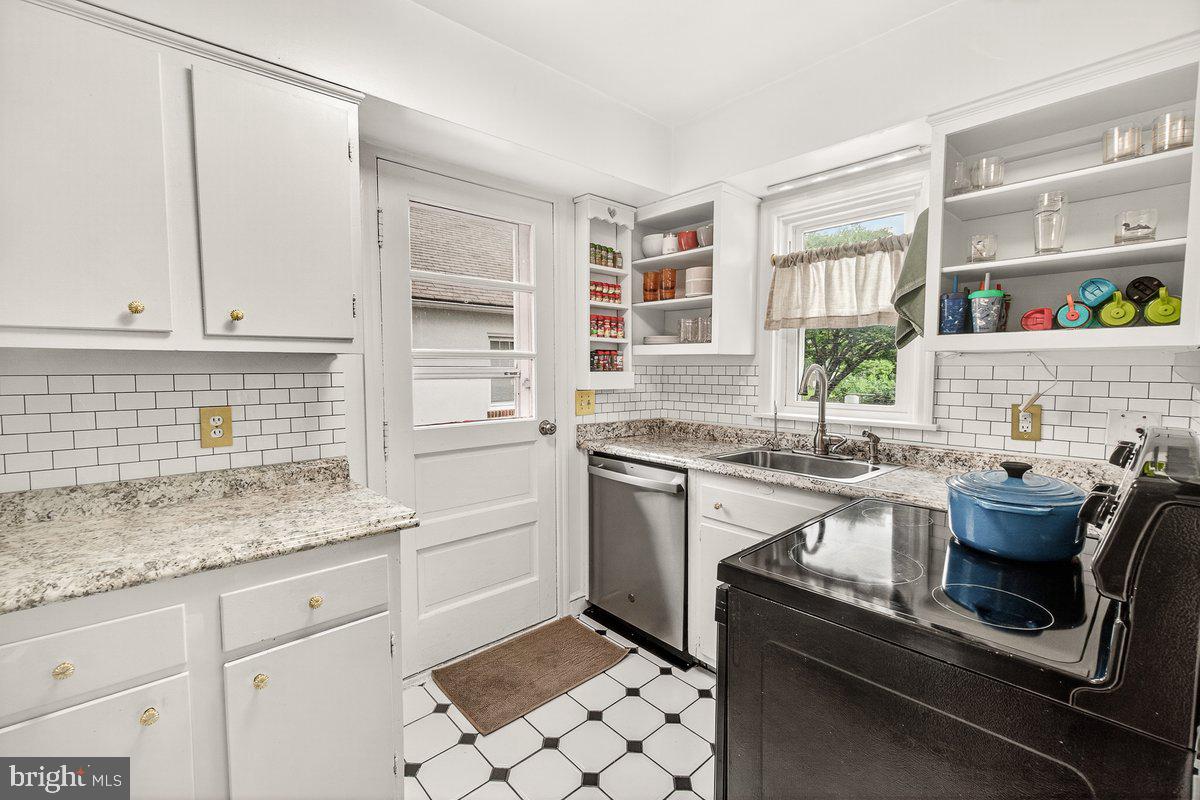 22 Norva Avenue Frederick, MD 21701 - Photo 11 of 37 a kitchen with a sink cabinets and window